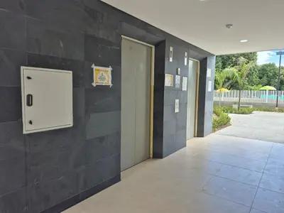 a hallway with a wall with a door at Apartasol Moderno bajo el Sol de Santa Fe in Santa Fe de Antioquia