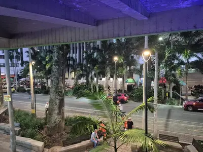 a view of a city street at night at Hotel bastilla real in Medellín