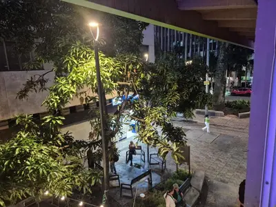 an overhead view of a courtyard with trees and a pool at Hotel bastilla real in Medellín