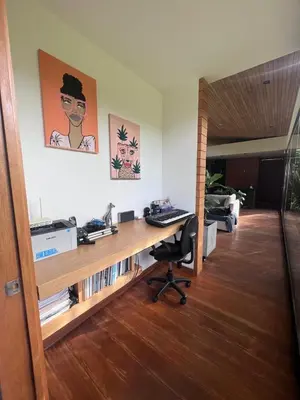 an office with a desk and a chair in a room at Beautiful house in nature minutes from Medellín in El Retiro