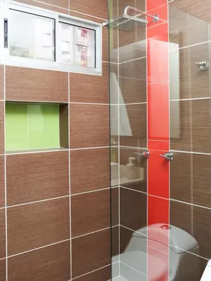 a bathroom with a glass shower with a toilet at Relax Medellín 10ppl 3br 4b Jacuzzi 2,075 sq ft in Medellín