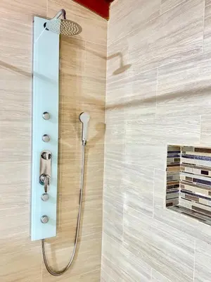 a shower with a shower head in a bathroom at SkyView Medellín 4ppl 1br 1b luxury terrace loft in Medellín