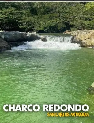 a picture of a river with a waterfall at Hotel La Curva Parrilla Bar Confort in San Carlos