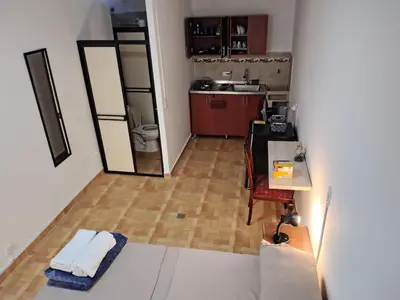 a view of a kitchen from the top of a room at Cómodo Apartamento Independiente Primer Piso - Belén La 80 in Medellín