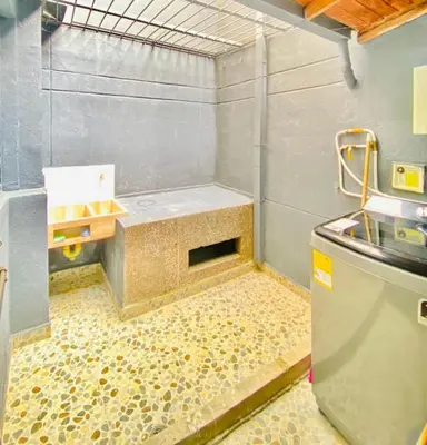 a small bathroom with a shower with a sink at Hermoso apartamento nuevo ! A un paso de la 70 zona vip in Medellín