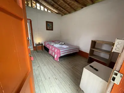 a room with a bed and a ladder in it at Aldea Los Pioneros in Venecia