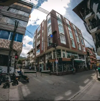 a building on a city street with motorcycles parked in front at WalApar in San Rafael