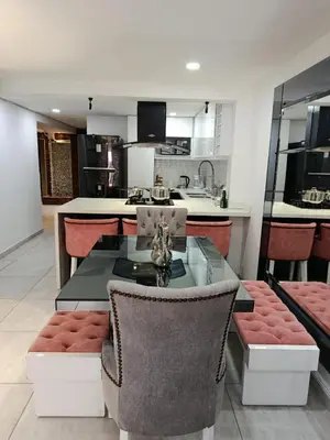 a kitchen and dining room with a table and chairs at Refugio Sereno en Itagüí in Itagüí
