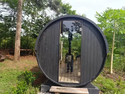 a circular building with a mirror in front of it at Madeira Majestic Hotel in Doradal