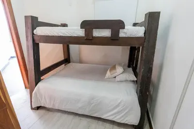 a couple of bunk beds in a room at Finca la Princesa Eastern Antioquia in Carmen de Viboral