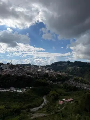 a view of a city on a hill at Descansa, comodidad y confort in Manizales