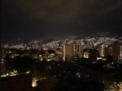 a view of a city at night at Modern and cozy apartment - Laureles Estadio in Medellín