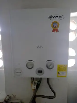 a white electrical box with aqual at VILLA La May in Medellín