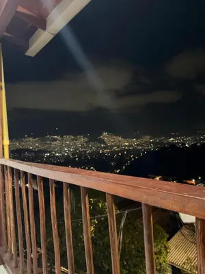 a view from the deck at night at Apartamento Comuna 13 in Medellín