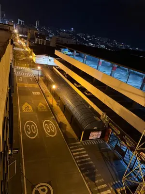 a train station at night with a subway station at Lu alojamiento parque caldas in Manizales
