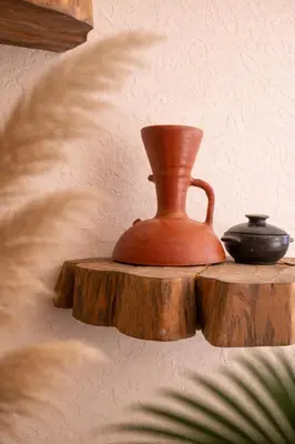a wooden table with a tea pot on top of it at Casa Museo Living by HOUSY in Medellín