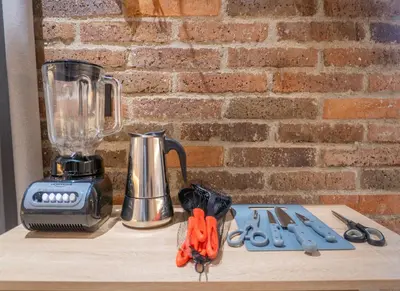 a counter top with a blender and a blender at Brand New Premium Apartment with Large Balcony in Medellín