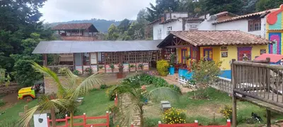 a model of a house with a garden in front of it at Cabañas Miraluna in Santa Elena