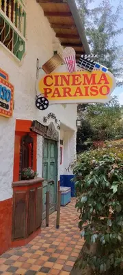 a sign on the side of a building at Cabañas Miraluna in Santa Elena