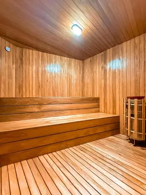 a large wooden sauna with a wooden floor and a wooden at Luxury Country Suite in Retiro, Antioquia in El Retiro