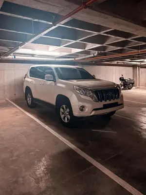 a white suv parked in a parking garage at Luxury Country Suite in Retiro, Antioquia in El Retiro
