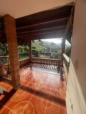 an empty balcony with a view of a mountain at Finca villa mia in Girardota