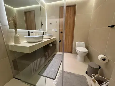 a bathroom with a sink and a toilet at Arroyuelos in Estación El Salto