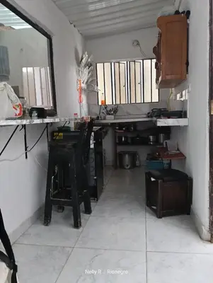 a room with a desk and a table in a room at Apartaestudio Ríonegro in Rionegro