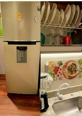 a refrigerator in a kitchen next to a sink at Cabaña Sensorial Vista y Silencio Total a 40 minutos de Medellín in San Vicente