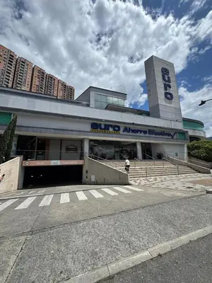 a building with a sign on the side of it at Aluna in Estación El Salto