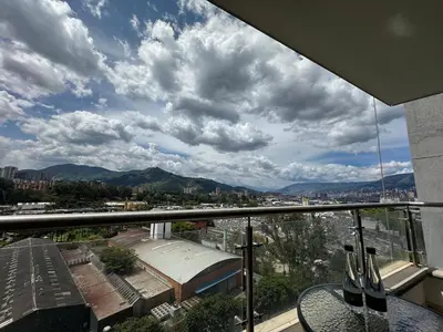a view of a city from the balcony of a building at Aluna in Estación El Salto