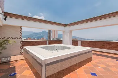 a large bathroom with a large tub on a balcony at 504-Apartamento 3BR a Pasos del Parque de Sabaneta in Sabaneta