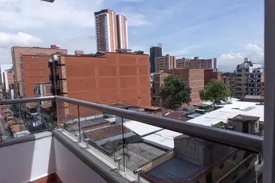 a balcony with a view of a city at 504-Apartamento 3BR a Pasos del Parque de Sabaneta in Sabaneta