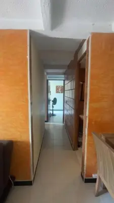 an empty hallway with a hallway leading to a room at Camino de los Vientos in Bello