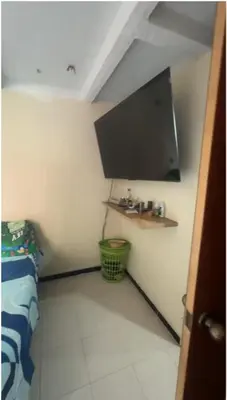 a small room with a bed and a cabinet at Camino de los Vientos in Bello