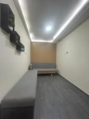 a room with a bed in the middle of it at la pausa 3 Los molinos in Medellín