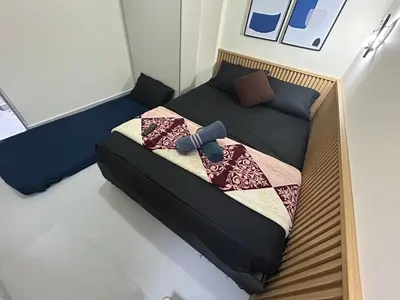 a bedroom with two beds in a room at la pausa 3 Los molinos in Medellín