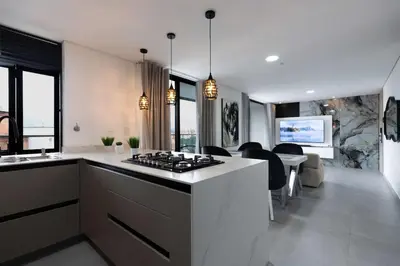 a kitchen with a stove top oven in a room at Exclusivo apartamento en laureles cerca al estadio in Medellín