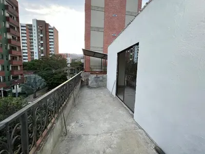 a balcony of a building with a door open at Hermoso apartamento con excelente ubicación in Medellín