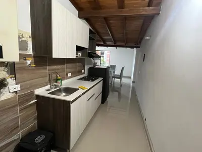 a kitchen with a sink and a counter top at Hermoso apartamento con excelente ubicación in Medellín