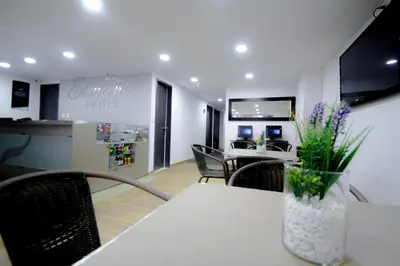 an office with a table and chairs and a counter at Element Hotel in Medellín