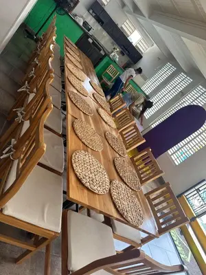 a row of tables and chairs in a recording room at Monteverde Hotel in La Dorada