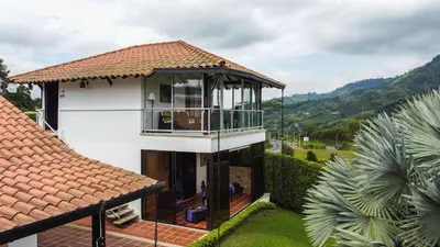 an aerial view of a house with a roof at Hotel Jade Spa in Santa Rosa de Cabal