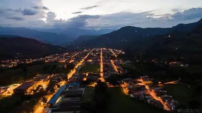 an aerial view of a city at night at Fami Hotel Vive Jardin in Jardin