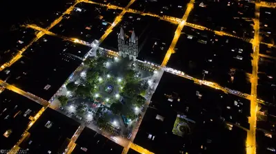 an aerial view of a building at night at Fami Hotel Vive Jardin in Jardin