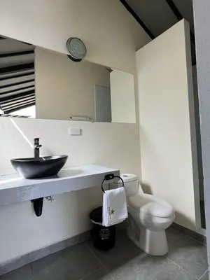 a bathroom with a sink and a toilet at STAR CENTER Hotel Boutique in Rionegro
