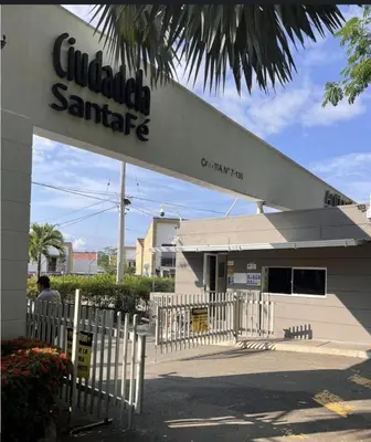 a building with a sign that reads guided santara at Ciudadela Santafe in Santa Fe de Antioquia