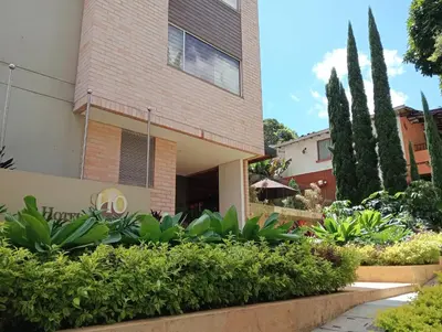 a building with plants in front of it at Hotel Lomas 10 Medellin in Medellín