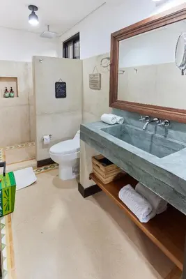 a bathroom with a sink and a toilet at Finca Boutique el Diamante in Salgar