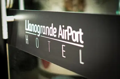 a sign that reads lomonote artrot hotel at Llanogrande Airport by Bernalo Hotels in Rionegro